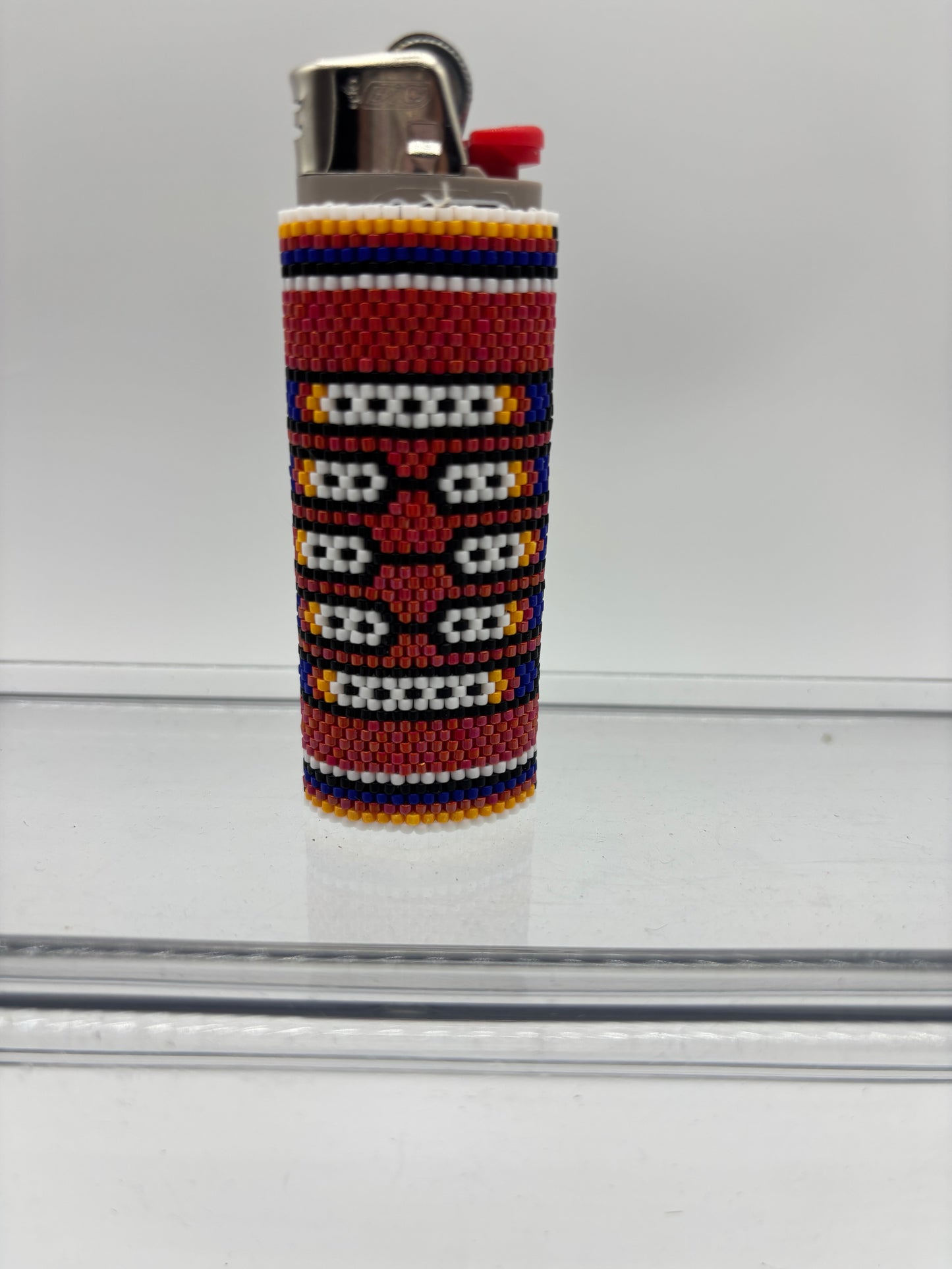 Indian inspired beaded lighter cover.