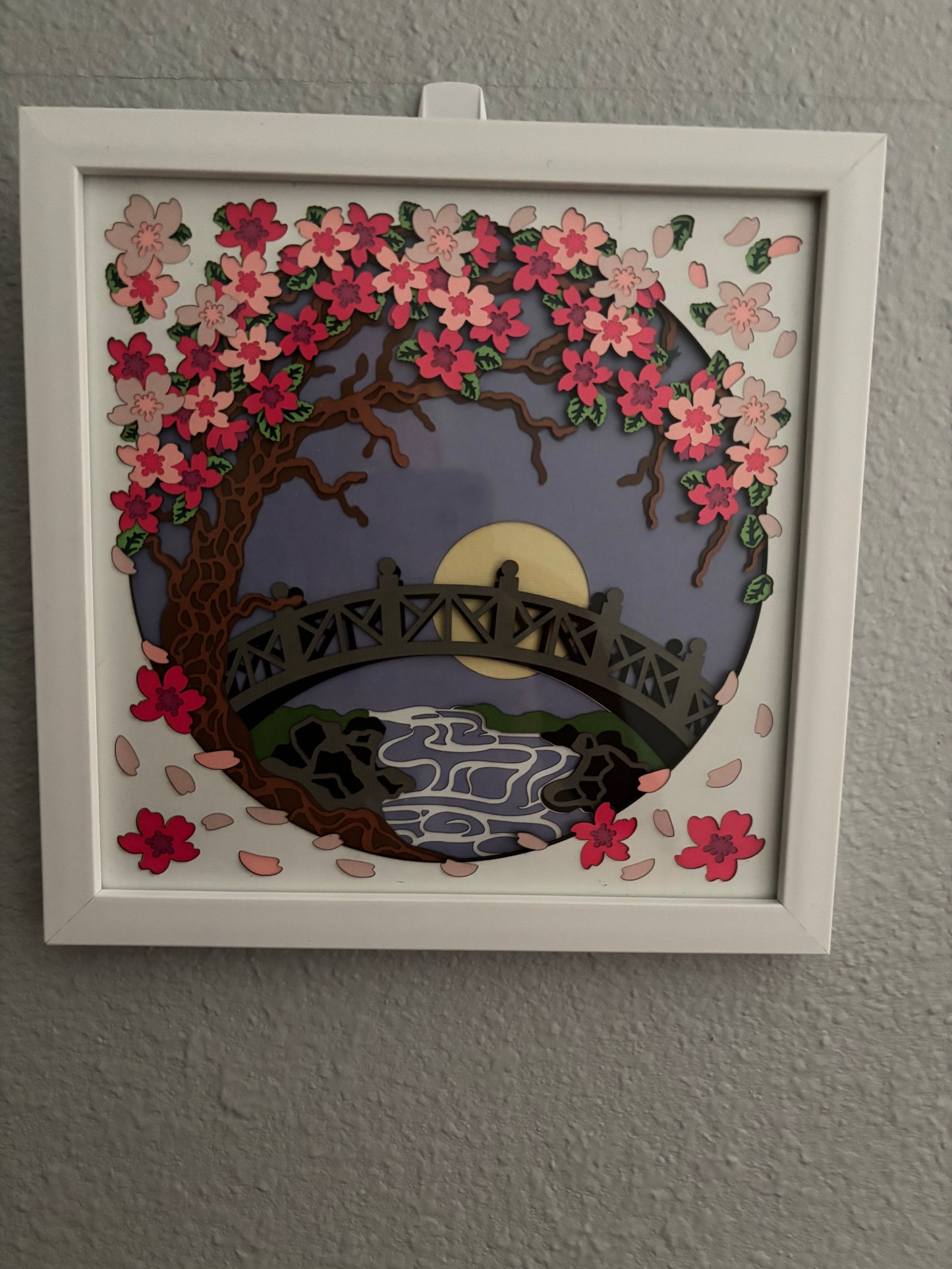 Japanese bridge over water layered paper cut picture