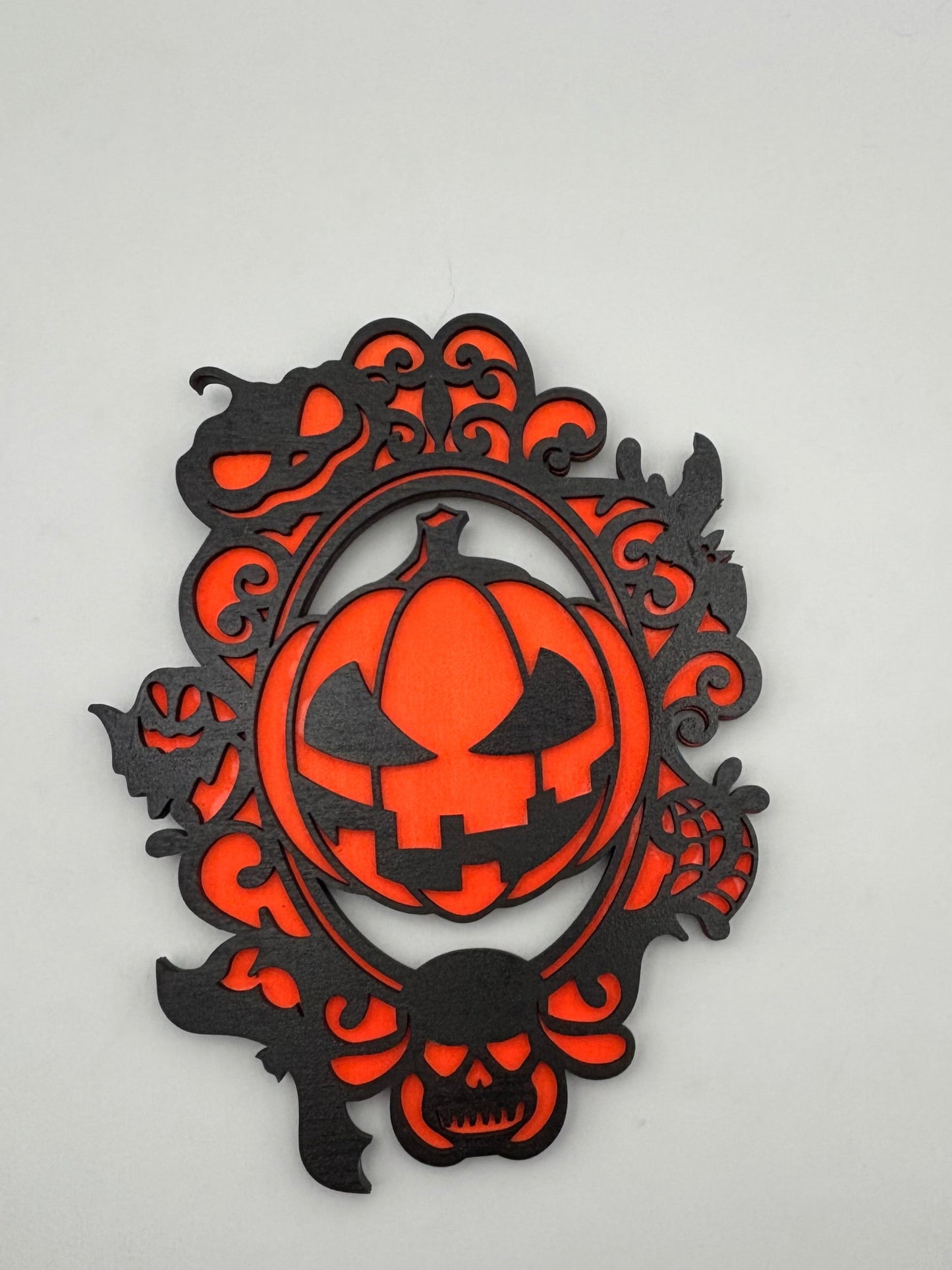Pumpkin wall hanging glow in the dark.