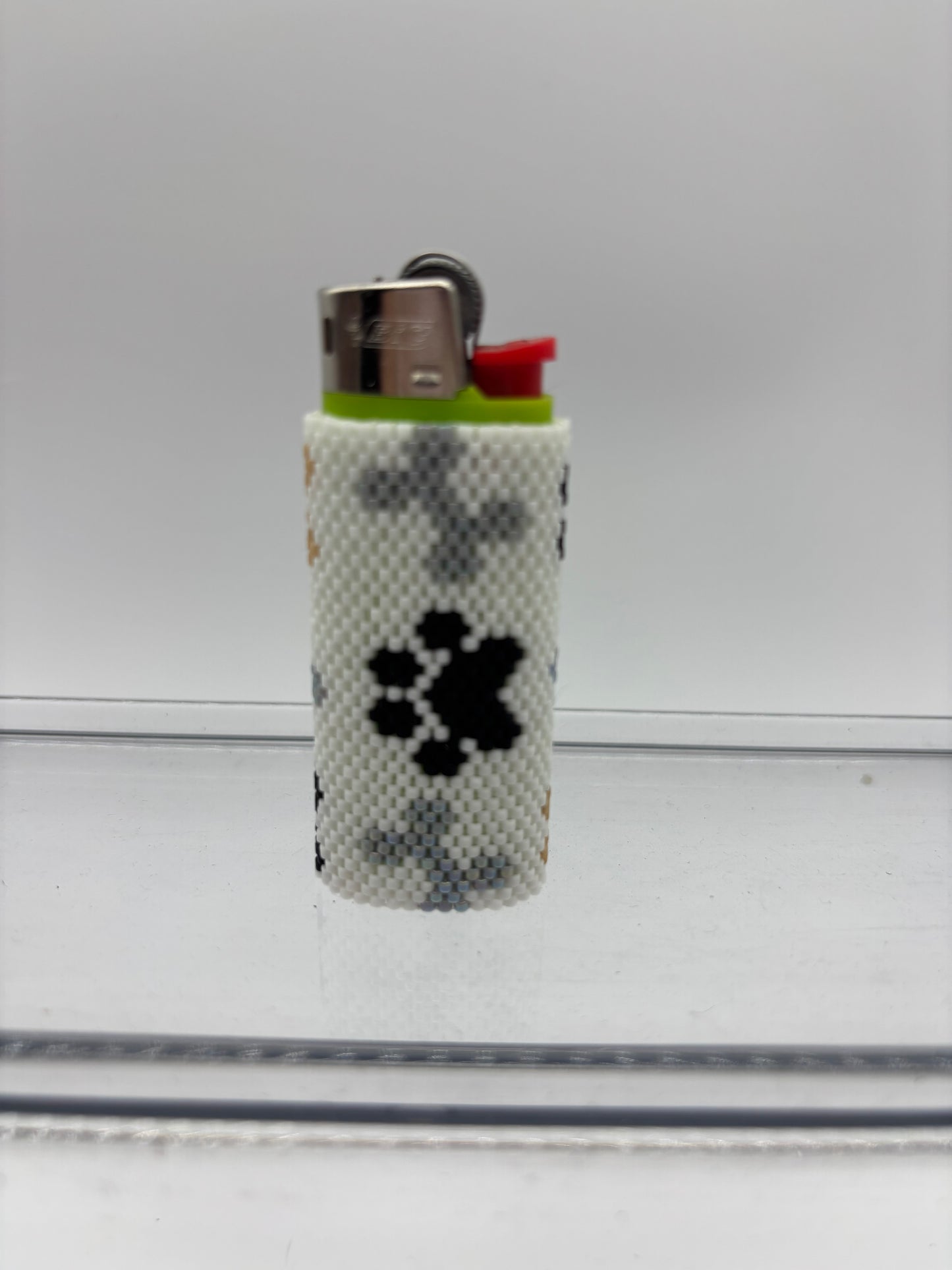 Dog paw and bone beaded lighter cover for a bic mini.