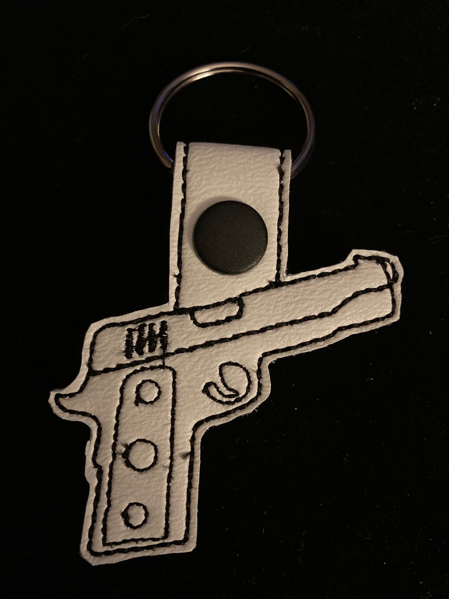 Embroidered gun keychain