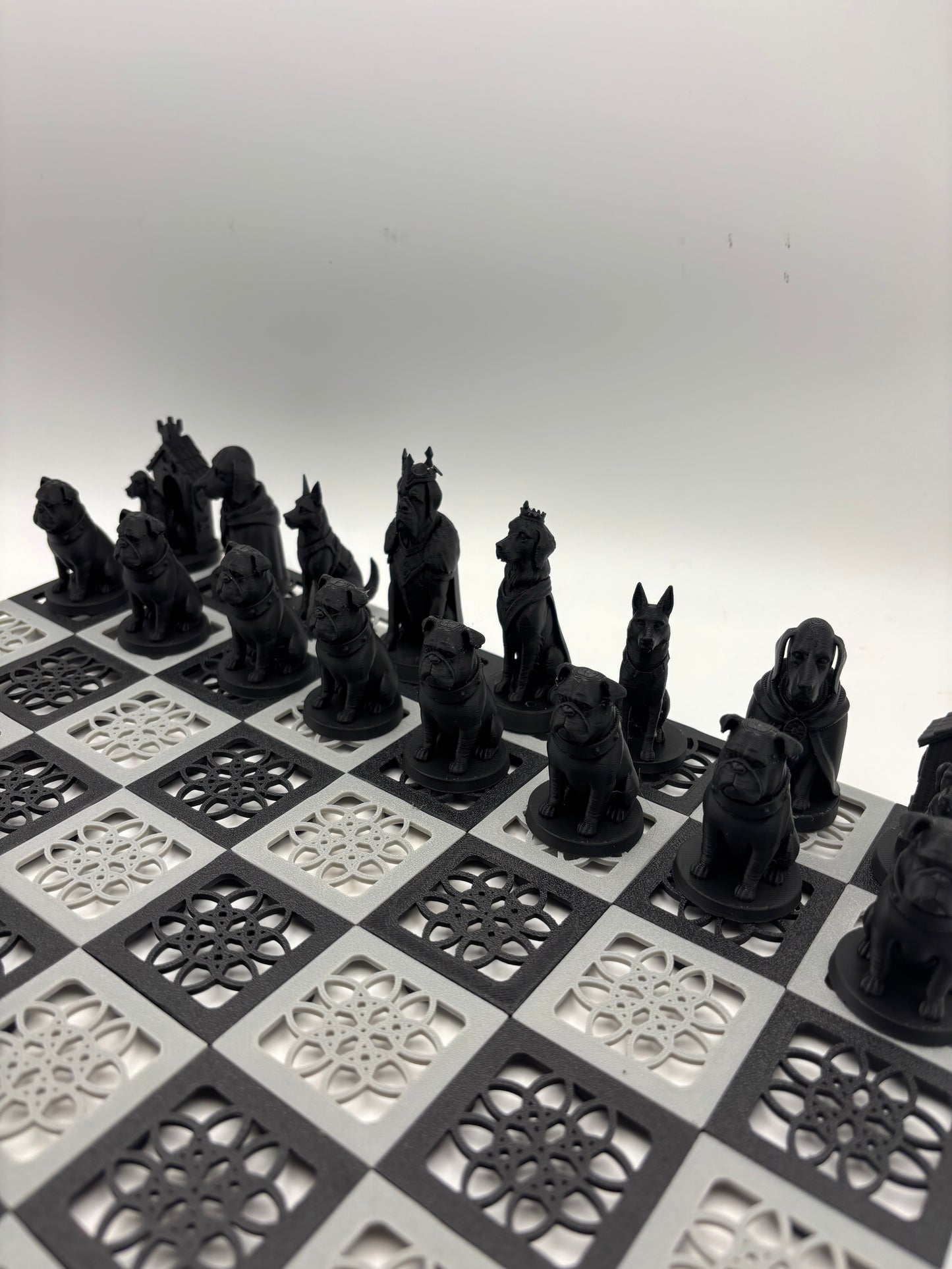 3D printed dogs verses cats chess set