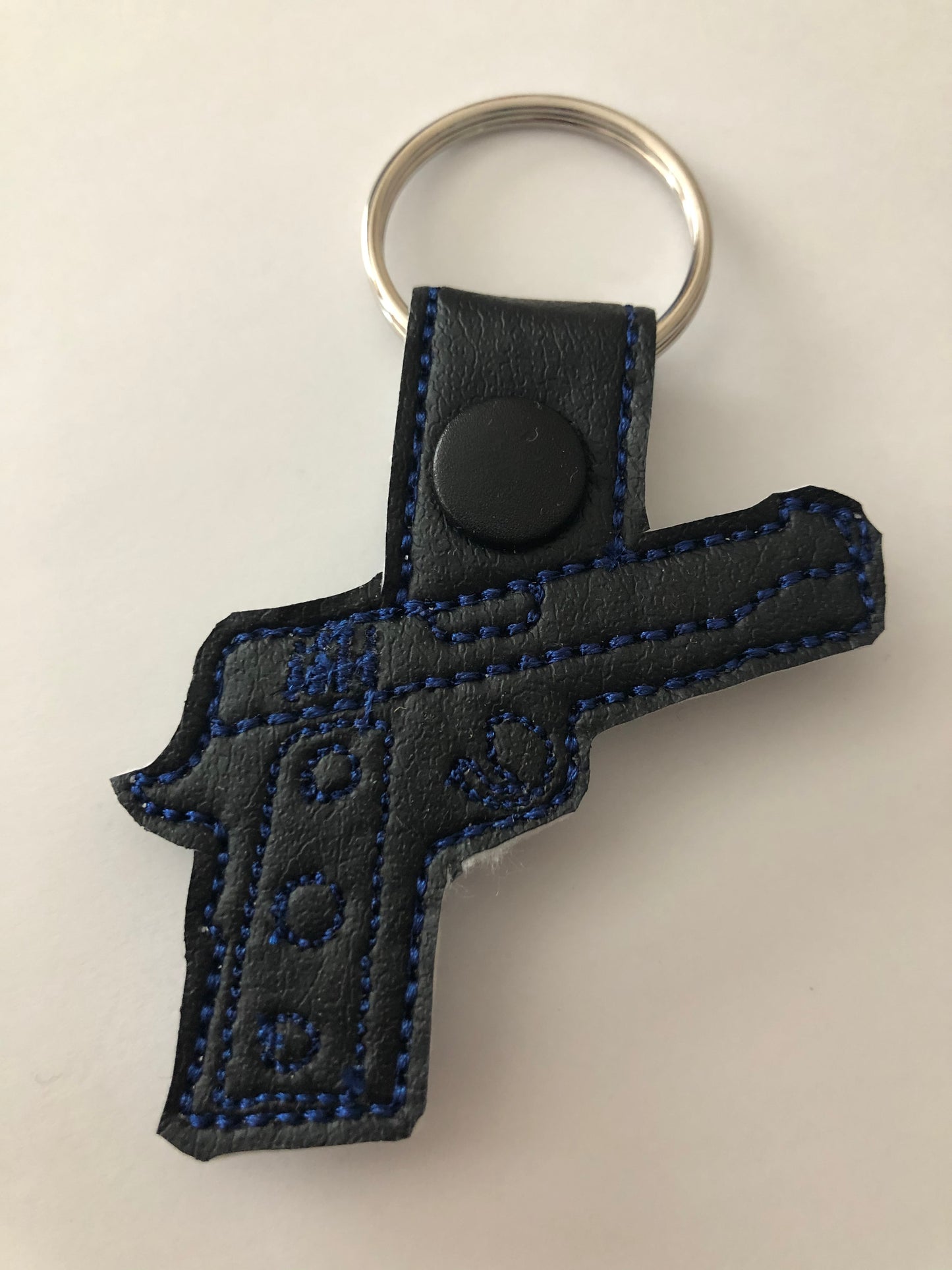 Embroidered gun key chain