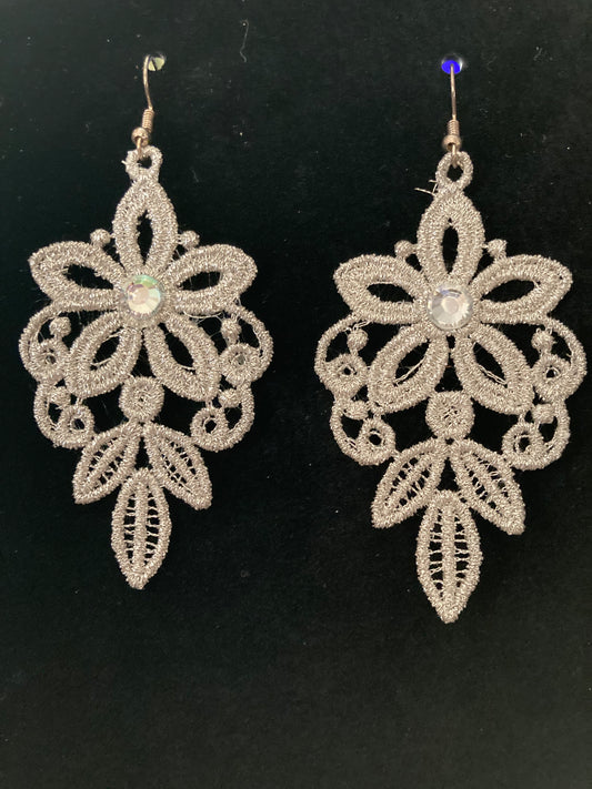 Embroidered earrings with embellishment