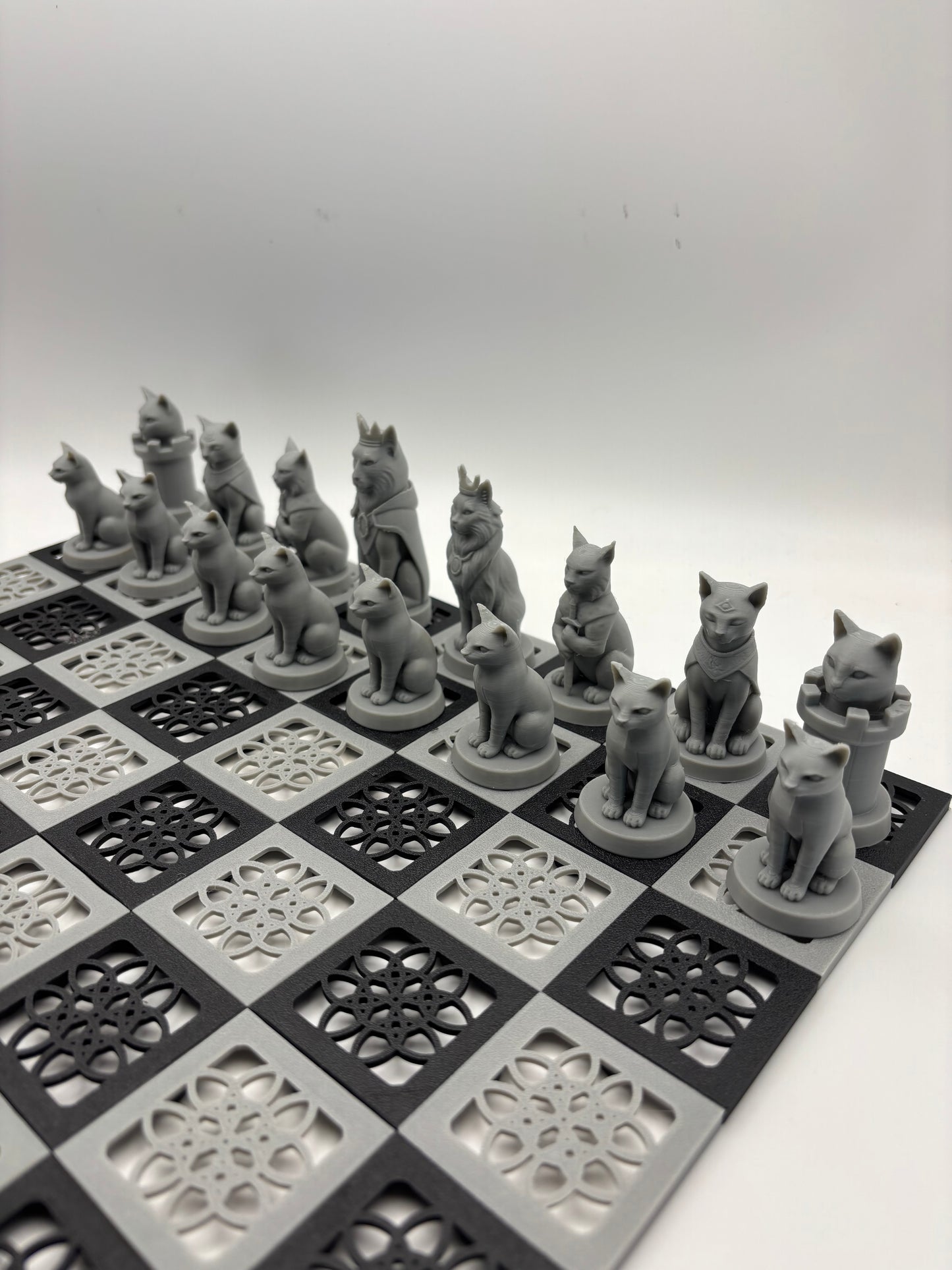 3D printed dogs verses cats chess set