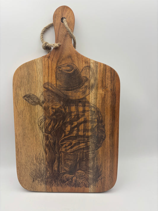 Little Cowboy and Calf cutting board