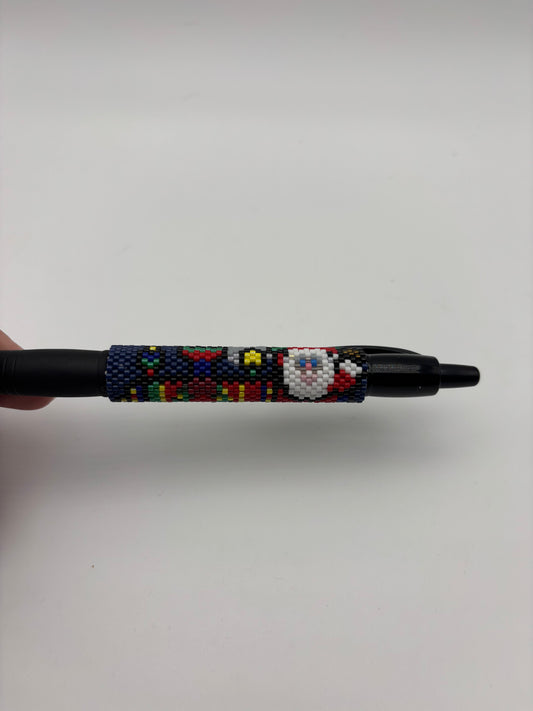 Santa in a Christmas train beaded pen cover