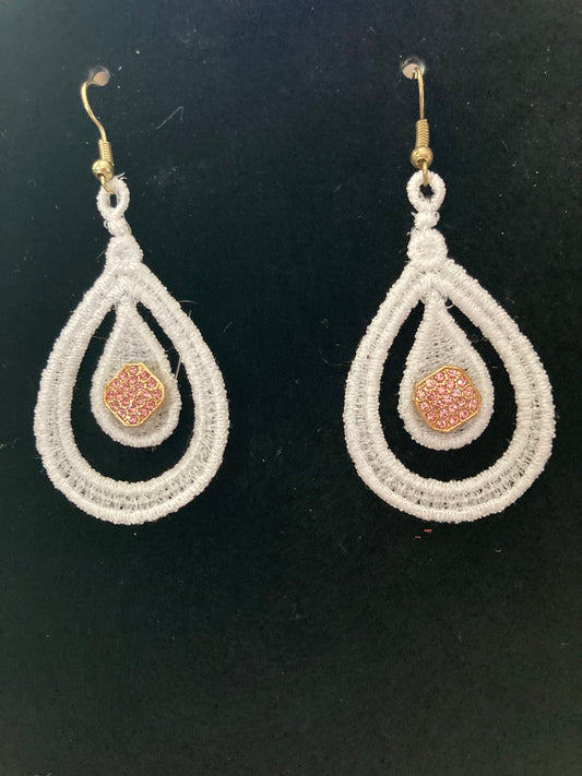 Embroidered earrings with embellishment