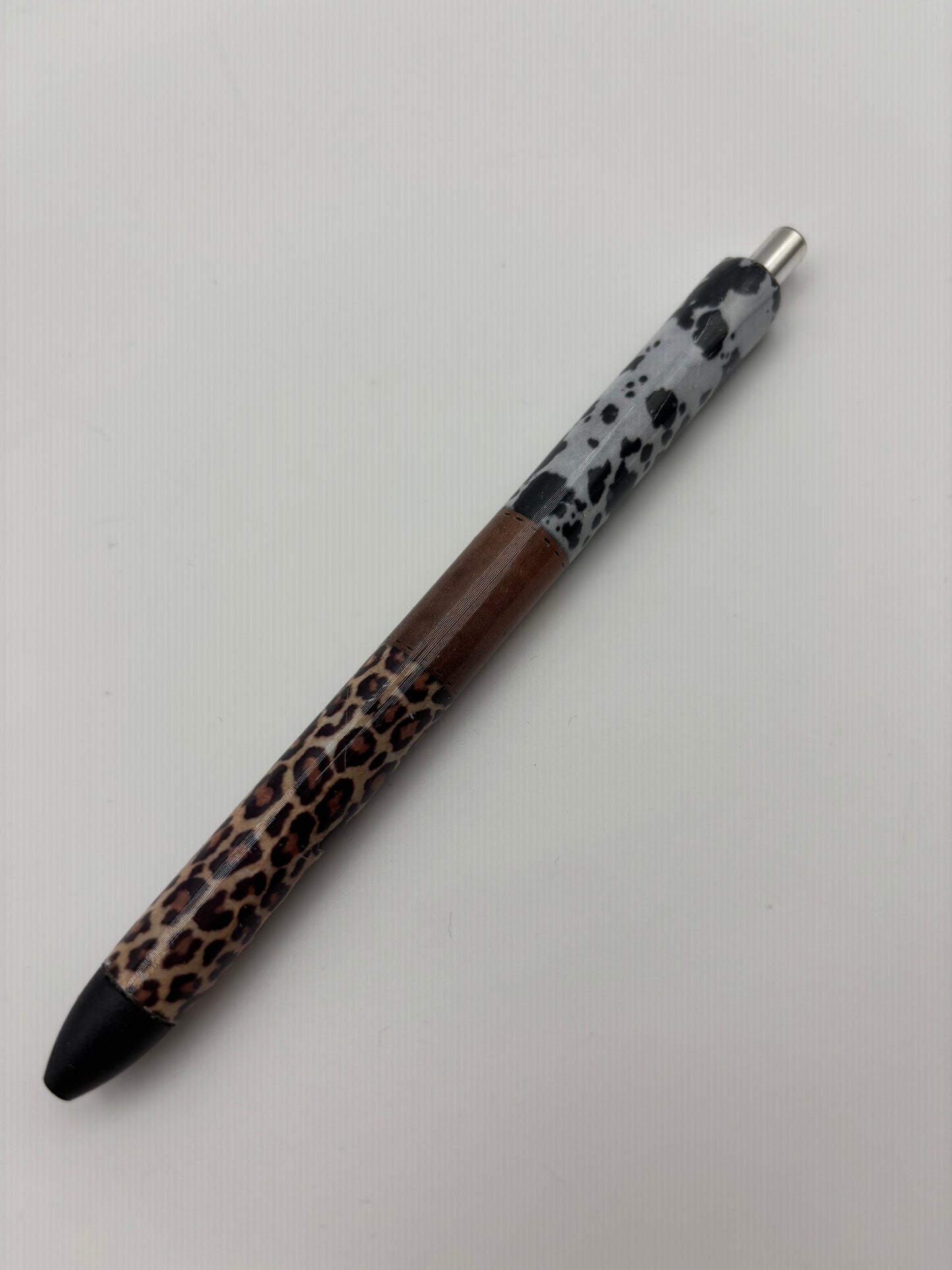 Cow and leopard spot pen