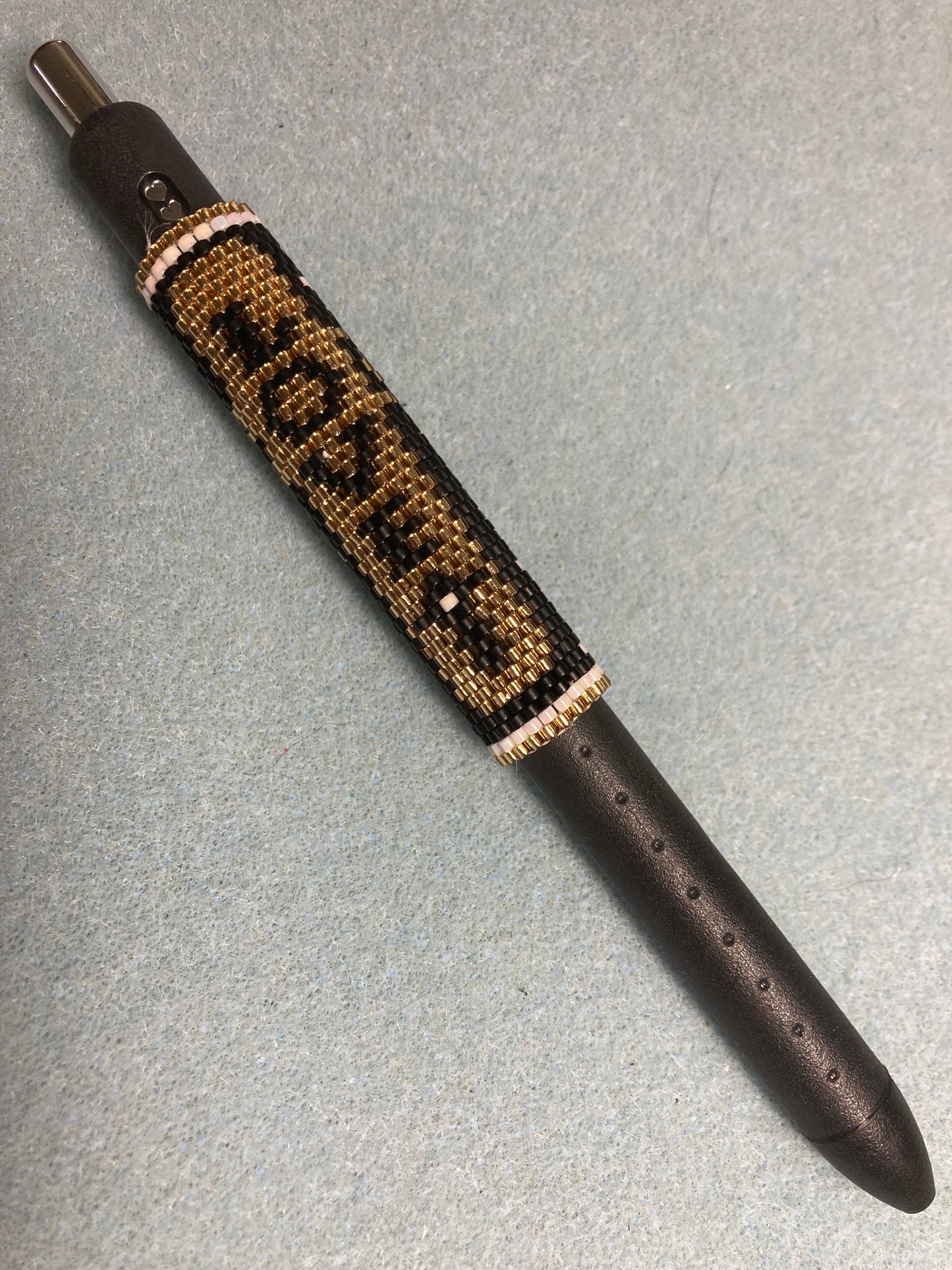 Beaded pen sleeve (God Loves)